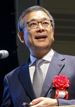 村井満氏